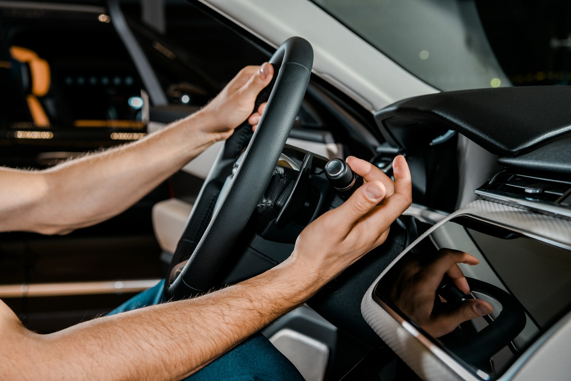partial view of mechanic checking car cleaning unit work